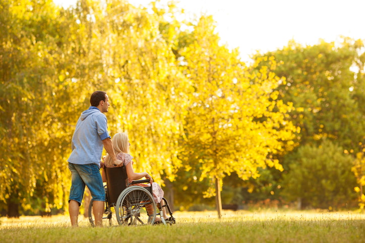 Handicapped Couple Outdoors. stock photo